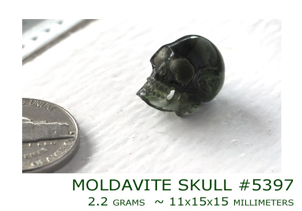 moldavite skull carving